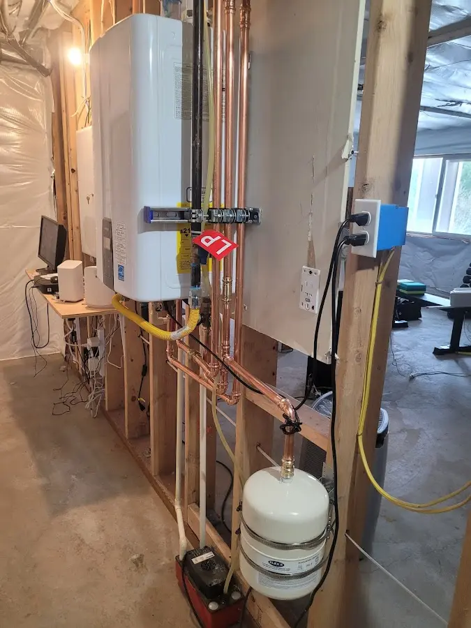 Licensed plumber repairing a kitchen sink in Kilgore